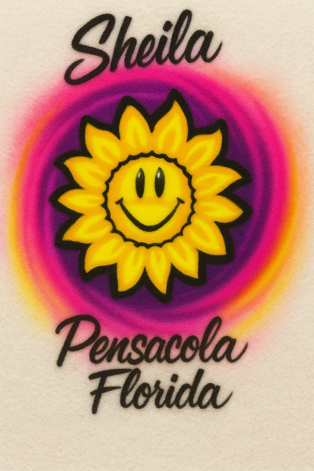 Sunflower with a smiley face in the center, surrounded by concentric circles of pink and purple, on a beige background. The name 'Sheila' and 'Pensacola Florida' are written above and below the sunflower respectively.